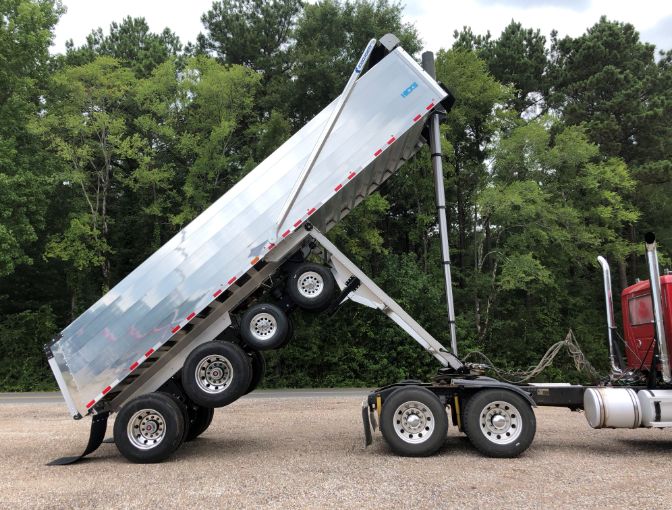 T6 All-American 28-Ft Quad trailer riased curbsider